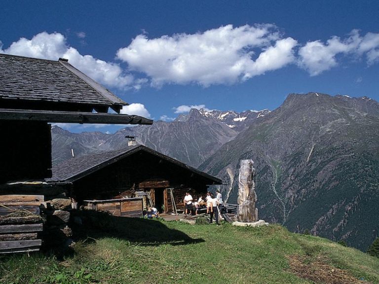 Alpine hut in the sunshine